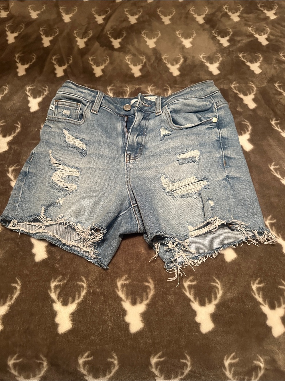 Judy Blue Light Wash Distressed Denim Cutoff Shorts